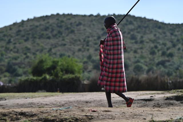 (260813) -- NAROK, Aug. 13, 2026 (Xinhua) -- A Maasai villager is pictured at a village around the Maasai Mara National Reserve in Narok, Kenya, on Aug. 12, 2026.
  The Maasai, one of the major tribes in Kenya, are still living a nomadic lifestyle. As local tourism develops, Maasai people have opened their villages to tourists to increase their income. (Xinhua/Liu Qiong)