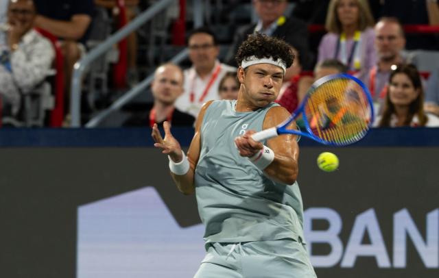 (260813) -- MONTREAL, Aug. 13, 2026 (Xinhua) -- Ben Shelton of the United States returns the ball during the men's singles semifinal match between Ben Shelton of the United States and Learner Tien of the United States at the 2026 National Bank Open tennis tournament in Montreal, Canada, Aug. 12, 2026. (Photo by Li Haitao/Xinhua)