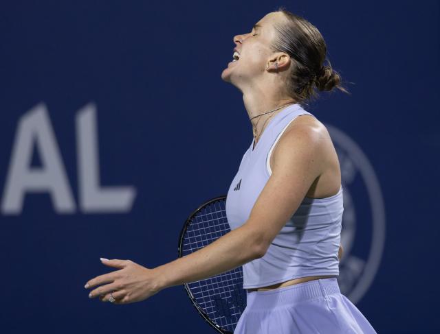 (260813) -- TORONTO, Aug. 13, 2026 (Xinhua) -- Elina Svitolina of Ukraine reacts during the women's singles semifinal match between Elina Svitolina of Ukraine and Iga Swiatek of Poland at the 2026 National Bank Open tennis tournament in Toronto, Canada, on Aug. 12, 2026. (Photo by Zou Zheng/Xinhua)