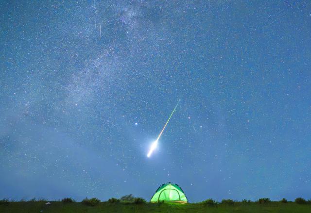 (260813) -- BEIJING, Aug. 13, 2026 (Xinhua) -- This photo taken on Aug. 13, 2026 shows Perseid meteor shower over Tongjiang City, northeast China's Heilongjiang Province. Perseid meteor shower, which peaks on August 12 and 13 this year, is an annual meteor shower that occurs from mid-July to late August. (Photo by Li Wenbin/Xinhua)