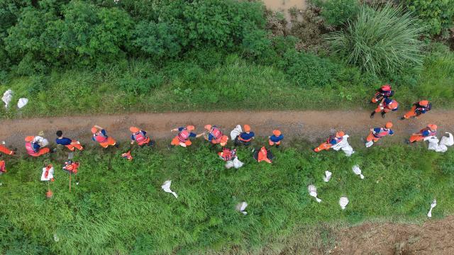 (260813) -- PINGDINGSHAN, Aug. 13, 2026 (Xinhua) -- An aerial drone photo shows repair work underway at the site of a levee breach along the Beiru River in Jiaxian County, central China's Henan Province, Aug. 13, 2026.
  Thousands of people have been evacuated in Henan Province after days of torrential rain swelled rivers and triggered a levee breach, local authorities said Thursday.
  In Pingdingshan City, more than 2,000 people were relocated to safety after a levee along the Beiru River in Jiaxian County gave way on Wednesday night, following extreme rainfall and large-volume discharges from upstream reservoirs. No casualties have been reported so far. (Xinhua/Yang Jinxin)