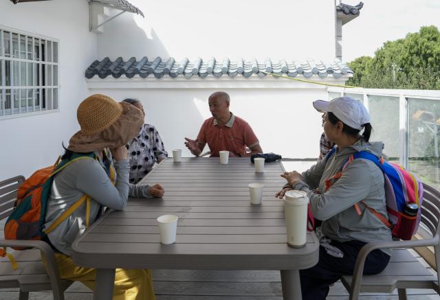 (260813) -- ZHAOTONG, Aug. 13, 2026 (Xinhua) -- Fan Qiang (3rd L), a sojourner from southwest China's Sichuan Province, shares his sojourn experience with several tourists visiting for summer retreat at his rented sojourn residence in Lyuyintang Natural Village of Xunlong Village in Sayu Town, Zhaoyang District, Zhaotong City, southwest China's Yunnan Province, Aug. 13, 2026. In recent years, Zhaoyang District in Zhaotong City has leveraged its cool and pleasant climate to boost the in-depth sojourn tourism experience as a summer retreat.
   The local government has introduced special support policies for summer retreat tourism, optimizing services including dining, lodging, transportation, sightseeing, shopping, and entertainment. (Xinhua/Chen Xinbo)