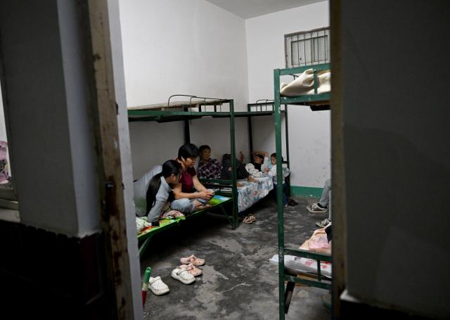 (260813) -- LUOHE, Aug. 13, 2026 (Xinhua) -- Evacuated residents rest at a temporary shelter in Beiwudu Town of Wuyang County, Luohe, central China's Henan Province, Aug. 13, 2026. Thousands of people have been evacuated in central China's Henan Province after days of torrential rain swelled rivers and triggered a levee breach, local authorities said Thursday.
  In Luohe City, more than 4,500 people from 10 villages were evacuated amid rising concerns over potential river flooding.
  From Monday afternoon to Wednesday afternoon, the city recorded an average rainfall of 270.1 millimeters, with a peak of 434.2 millimeters, prompting authorities to activate the highest-level flood control emergency response. (Xinhua/Hao Yuan)