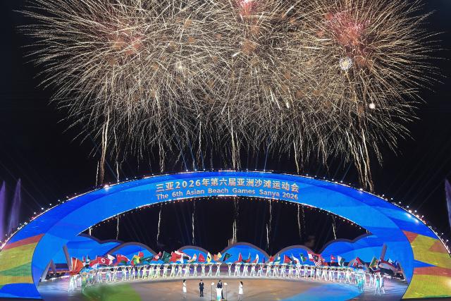(260813) -- HAIKOU, Aug. 13, 2026 (Xinhua) -- Fireworks explode during the opening ceremony of the 6th Asian Beach Games 2026 in Sanya, south China's Hainan Province, April 22, 2026. Hainan is stepping up with efforts to build a world-class destination for international tourism and consumption as a key component of the Hainan Free Trade Port, and to probe for a new path towards high-quality development in its tourism-led consumer economy with distinctive local characteristics. 
   Hainan is projected to annually receive 154 million counts of domestic and international visits by 2030, along with tourism-related revenue of 363 billion yuan (about 53.83 billion U.S. dollars). (Xinhua/Zhao Yingquan)