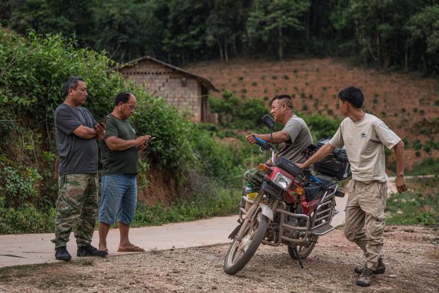 (260813) -- KUNMING, Aug. 13, 2026 (Xinhua) -- Peng Jinfu (1st L), an Asian elephant monitor, communicates with his colleagues in Jinghong City, Xishuangbanna Dai Autonomous Prefecture, southwest China's Yunnan Province, May 27, 2026. The "short-nose family" of wild Asian elephants captured worldwide attention in 2021 after roaming more than 1,400 kilometers across Yunnan Province. It returned to its traditional habitat with 14 members. Embracing two calves born this year, members of the family have since grown to 21.
  Yunnan has developed a comprehensive approach to Asian elephant conservation that combines habitat restoration, connected habitats, scientific monitoring and early warning, community participation and cross-border cooperation. The province is also home to the Xishuangbanna Asian Elephant Breeding and Rescue Center, which has rescued and rehabilitated more than 30 wild Asian elephants since its establishment in 2009.
  China has established 11 nature reserves covering a total of 5,098 square kilometers across wild Asian elephant habitats. The country's wild Asian elephant population has risen from about 150 in the 1980s to nearly 400 today. (Xinhua/Wang Guansen)