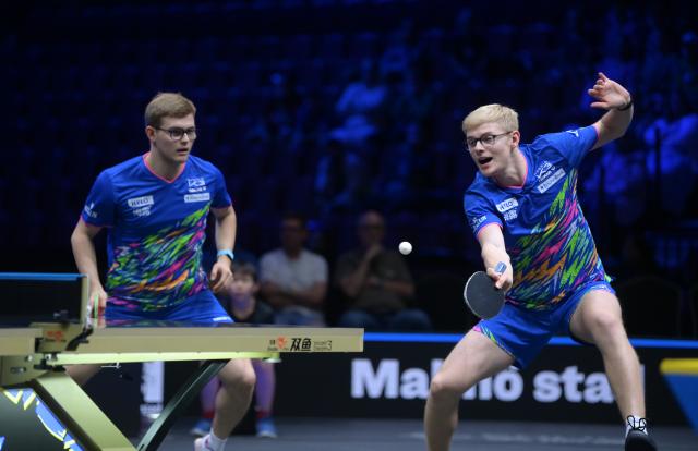 (260813) -- MALMO, Aug. 13, 2026 (Xinhua) -- Alexis Lebrun/Felix Lebrun (R) compete during the men's doubles quarterfinal match between China's Lin Shidong/Wen Ruibo and Alexis Lebrun/Felix Lebrun of France at the WTT Europe Smash Sweden 2026 in Malmo, Sweden, Aug. 13, 2026. (Xinhua/Weng Xinyang)
