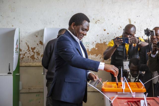 (260813) -- LUSAKA, Aug. 13, 2026 (Xinhua) -- Incumbent Zambian President Hakainde Hichilema casts his vote at a polling station in Lusaka, Zambia, on Aug. 13, 2026. Zambian voters turned out in large numbers on Thursday to cast their ballots in the general elections amid a largely peaceful atmosphere. (Photo by Martin Mbangweta/Xinhua)