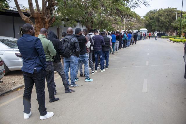 (260813) -- LUSAKA, Aug. 13, 2026 (Xinhua) -- Voters queue to cast their ballots at a polling station in Lusaka, Zambia, on Aug. 13, 2026. Zambian voters turned out in large numbers on Thursday to cast their ballots in the general elections amid a largely peaceful atmosphere. (Photo by Martin Mbangweta/Xinhua)