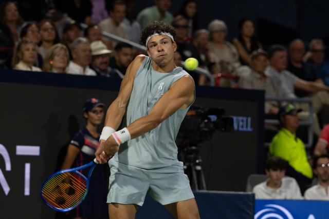 (260814) -- MONTREAL, Aug. 14, 2026 (Xinhua) -- Ben Shelton returns the ball during the men's singles final match between Ben Shelton of the United States and Brandon Nakashima of the United States at the 2026 National Bank Open tennis tournament in Montreal, Canada, Aug. 13, 2026. (Photo by Li Haitao/Xinhua)