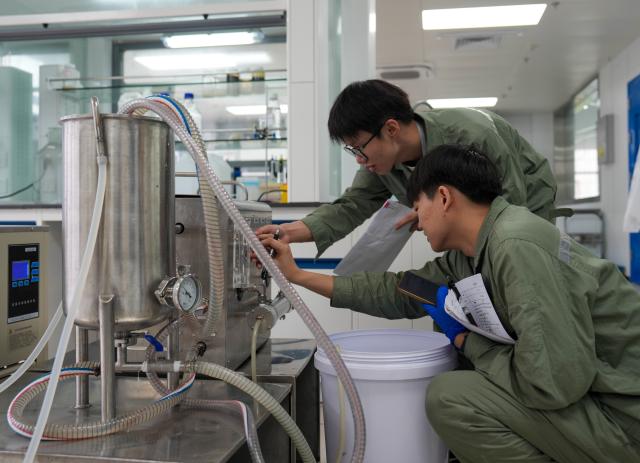 (260814) -- CHANGDE, Aug. 14, 2026 (Xinhua) -- Staff members work at a lab of the Hunan Lier Biotech Co., Ltd. in Jinshi City of Changde, central China's Hunan Province, on Aug. 13, 2026. In recent years, Jinshi City has stepped up efforts to develop its bio-manufacturing industry which dates back to the 1950s. The city is now home to 41 relevant companies engaged in fields including bio-agriculture, bio-pharmaceuticals and bio-food, with more than 200 high-end synthetic biology products in production. 
   In the first half of this year, the bio-manufacturing industry generated an output value of 2.09 billion yuan (about 310 million U.S. dollars), providing fresh impetus to the local economy. (Xinhua/Dai Mingxuan)