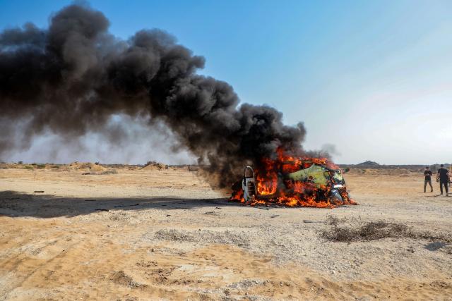 (260814) -- GAZA, Aug. 14, 2026 (Xinhua) -- A vehicle carrying Gaza Police Chief Jamal Mahmoud Abu Kamil is on fire after it was targeted by an Israeli airstrike on Rashid Street, southwest of Gaza City, on Aug. 13, 2026. The Hamas-run interior authorities in the Gaza Strip said on Thursday that the 43-year-old Gaza Police Chief Jamal Mahmoud Abu Kamil was killed in an Israeli airstrike that targeted his vehicle on Rashid Street, southwest of Gaza City. (Photo by Rizek Abdeljawad/Xinhua)