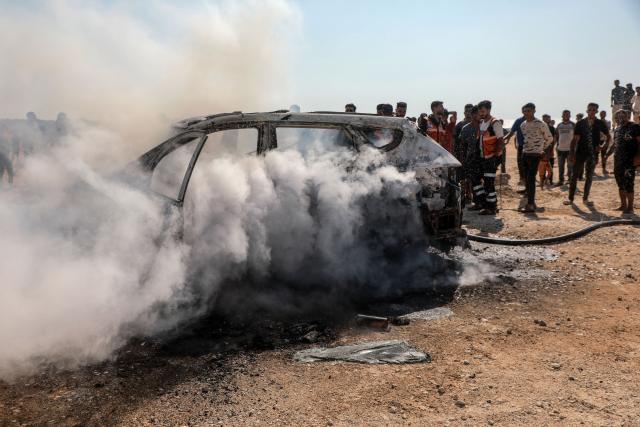 (260814) -- GAZA, Aug. 14, 2026 (Xinhua) -- A vehicle carrying Gaza Police Chief Jamal Mahmoud Abu Kamil is pictured after it was targeted by an Israeli airstrike on Rashid Street, southwest of Gaza City, on Aug. 13, 2026. The Hamas-run interior authorities in the Gaza Strip said on Thursday that the 43-year-old Gaza Police Chief Jamal Mahmoud Abu Kamil was killed in an Israeli airstrike that targeted his vehicle on Rashid Street, southwest of Gaza City. (Photo by Rizek Abdeljawad/Xinhua)