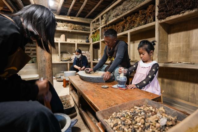(260814) -- ABA, Aug. 14, 2026 (Xinhua) -- Tourists learn Tibetan incense making from an instructor at a studio in Aba County, Aba Tibetan and Qiang Autonomous Prefecture, southwest China's Sichuan Province, Aug. 12, 2026. In recent years, Aba Tibetan and Qiang Autonomous Prefecture has leveraged its rich plateau resources to promote the development of agriculture and tourism, injecting new impetus into rural revitalization here. (Xinhua/Wang Xi)