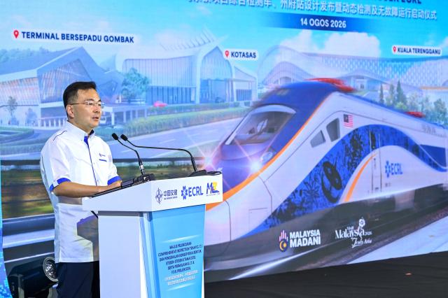 (260814) -- SELANGOR, Aug. 14, 2026 (Xinhua) -- Zhang Bingnan, Executive Director and President of China Communications Construction Company (CCCC), speaks during a launch ceremony held at the Gombak station of the East Coast Rail Link (ECRL) in Selangor state, Malaysia, Aug. 14, 2026. The East Coast Rail Link (ECRL), a mega rail project in Malaysia being built by the China Communications Construction Company (CCCC), is expected to begin commercial operations by January 2027, Transport Minister Anthony Loke Siew Fook said on Friday.
  In the meantime, the railway has reached 95.08 percent overall progress and has entered its testing and commissioning phase, keeping with its project schedule, Loke said in his speech at the launch ceremony of the ECRL Comprehensive Inspection Train (CIT). (Photo by Chong Voon Chung/Xinhua)