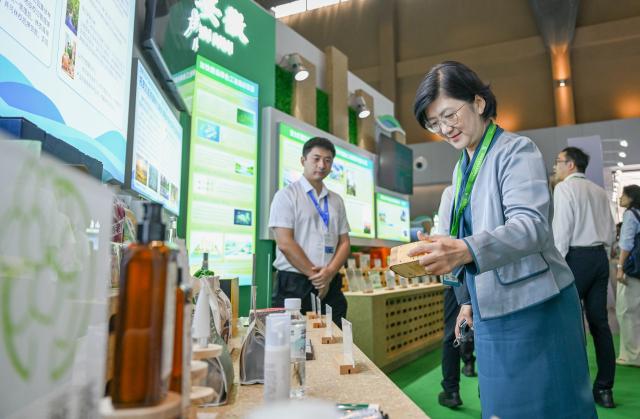 (260815) -- HULUNBUIR, Aug. 15, 2026 (Xinhua) -- Visitors view exhibits during a main event of the fourth National Ecology Day in Hulunbuir, north China's Inner Mongolia Autonomous Region, Aug. 15, 2026.
  China's top legislature designated Aug. 15 as National Ecology Day in 2023 to raise public awareness of ecological conservation and encourage action to protect the environment. (Xinhua/Lian Zhen)
