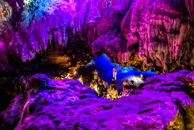 (260815) -- NANNING, Aug. 15, 2026 (Xinhua) -- Tourists visit a cave in Guilin, south China's Guangxi Zhuang Autonomous Region, Aug. 12, 2026. In recent years, Guangxi has tapped the tourism potential of its caves, developing them into popular attractions while ensuring visitor safety. (Xinhua/Zhang Ailin)