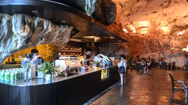 (260815) -- NANNING, Aug. 15, 2026 (Xinhua) -- Tourists rest in a cave in Guilin, south China's Guangxi Zhuang Autonomous Region, Aug. 12, 2026. In recent years, Guangxi has tapped the tourism potential of its caves, developing them into popular attractions while ensuring visitor safety. (Xinhua/Zhang Ailin)