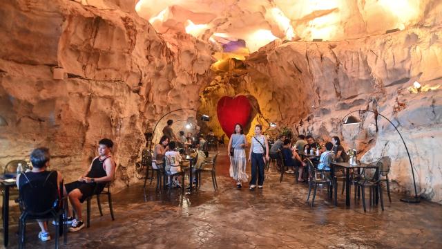 (260815) -- NANNING, Aug. 15, 2026 (Xinhua) -- Tourists rest in a cave in Guilin, south China's Guangxi Zhuang Autonomous Region, Aug. 12, 2026. In recent years, Guangxi has tapped the tourism potential of its caves, developing them into popular attractions while ensuring visitor safety. (Xinhua/Zhang Ailin)