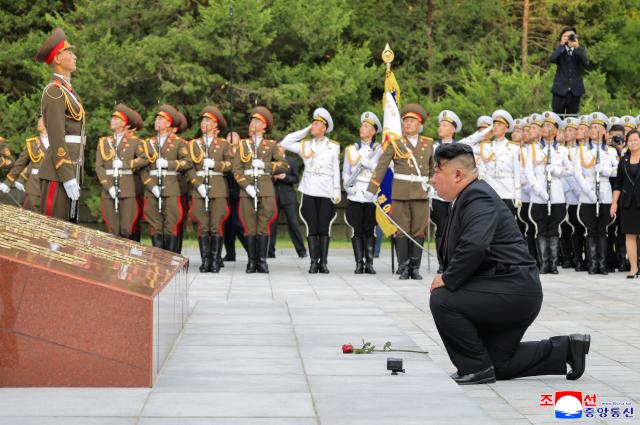 (260815) -- PYONGYANG, Aug. 15, 2026 (Xinhua) -- This photo provided by the Korean Central News Agency (KCNA) on Aug. 15, 2026 shows Kim Jong Un, general secretary of the Workers' Party of Korea and president of the State Affairs of the Democratic People's Republic of Korea (DPRK), paying tribute to anti-Japanese revolutionary martyrs at the Revolutionary Martyrs Cemetery on Mt. Taesong in the DPRK, Aug. 14, 2026.
  Kim visited the Revolutionary Martyrs Cemetery on Mt. Taesong on Friday on the occasion of the 81st anniversary of national liberation, the KCNA reported. (KCNA/Handout via Xinhua)
