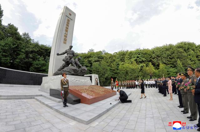 (260815) -- PYONGYANG, Aug. 15, 2026 (Xinhua) -- This photo provided by the Korean Central News Agency (KCNA) on Aug. 15, 2026 shows Kim Jong Un, general secretary of the Workers' Party of Korea and president of the State Affairs of the Democratic People's Republic of Korea (DPRK), paying tribute to anti-Japanese revolutionary martyrs at the Revolutionary Martyrs Cemetery on Mt. Taesong in the DPRK, Aug. 14, 2026.
  Kim visited the Revolutionary Martyrs Cemetery on Mt. Taesong on Friday on the occasion of the 81st anniversary of national liberation, the KCNA reported. (KCNA/Handout via Xinhua)