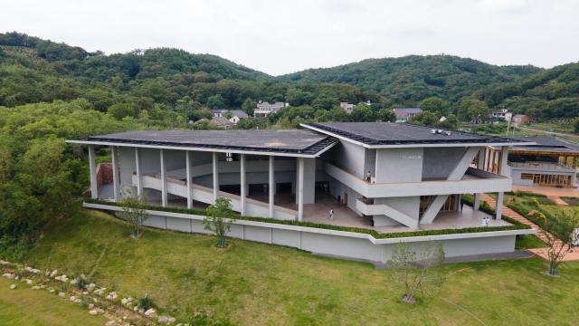 (260815) -- HEFEI, Aug. 15, 2026 (Xinhua) -- An aerial drone photo taken on July 26, 2025 shows a general view of a movie theater in Changchong Village of Lujiang County, east China's Anhui Province. (Xinhua/Zhang Duan)