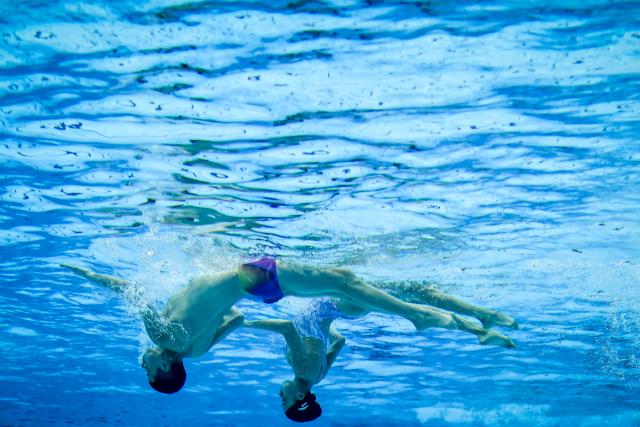 (260815) -- BUDAPEST, Aug. 15, 2026 (Xinhua) -- Chen Xiuping/Wang Ziyan (R) of China perform during the Mixed Duet Free Event of the World Aquatics Junior Artistic Swimming Championships in Budapest, Hungary, on Aug. 15, 2026. (Photo by David Balogh/Xinhua)