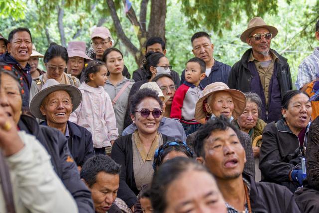 (260815) -- LHASA, Aug. 15, 2026 (Xinhua) -- People watch a Tibetan opera during the Shoton Festival in Lhasa, southwest China's Xizang Autonomous Region, Aug. 15, 2026. Tibetan opera blends talking, singing, acting, dancing and literature, which is a must-see performance for visitors during the Shoton Festival. (Xinhua/Tenzin Nyida)