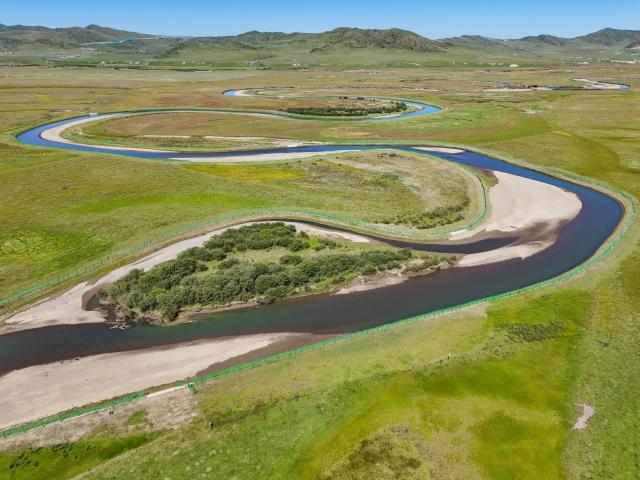 (260815) -- CHENGDU, Aug. 15, 2026 (Xinhua) -- An aerial drone photo taken on Aug. 13, 2026 shows a view of an ecological restoration project of a tributary of the Yellow River in Aba Tibetan-Qiang Autonomous Prefecture, southwest China's Sichuan Province. The Zoige Wetland is mostly located in Aba Tibetan-Qiang Autonomous Prefecture in southwest China's Sichuan Province. It is an important water source conservation area in the upper reaches of the Yellow River. In recent years, local authorities have carried out ecological restoration projects, including riverbank protection along the Yellow River, restoration of mining areas, grassland desertification control and wetland restoration. So far, a total area of 232,500 hectares has been restored. (Xinhua/Wang Xi)