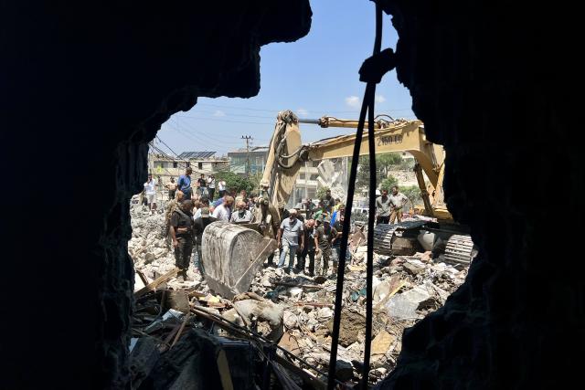 (260815) -- DEIR AL ZAHRANI, Aug. 15, 2026 (Xinhua) -- Rescuers search through the rubble of buildings hit by Israeli airstrikes in Deir Al Zahrani, southern Lebanon, Aug. 15, 2026. Lebanese broadcaster Al-Jadeed TV reported that four people were killed and nine others wounded after an Israeli airstrike hit a two-story building in the town of Deir Al Zahrani in the Nabatieh District. (Photo by Ali Hashisho/Xinhua)