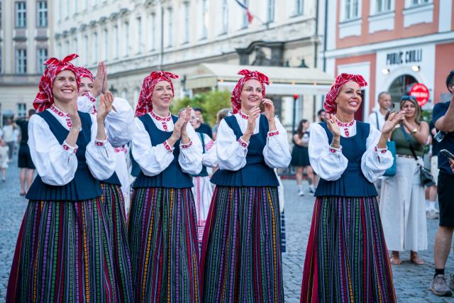 (260815) -- PRAGUE, Aug. 15, 2026 (Xinhua) -- People attend the Summer Folklore Festival in Prague, the Czech Republic, Aug. 15, 2026. The Summer Folklore Festival was held in Prague on Saturday, bringing together international folklore ensembles presenting their traditional dances, music and costumes. (Photo by Dana Kesnerova/Xinhua)