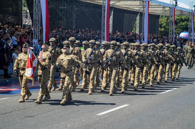 (260815) -- WARSAW, Aug. 15, 2026 (Xinhua) -- Soldiers take part in a military parade marking Polish Armed Forces Day in Warsaw, Poland, Aug. 15, 2026. (Photo by Jaap Arriens/Xinhua)