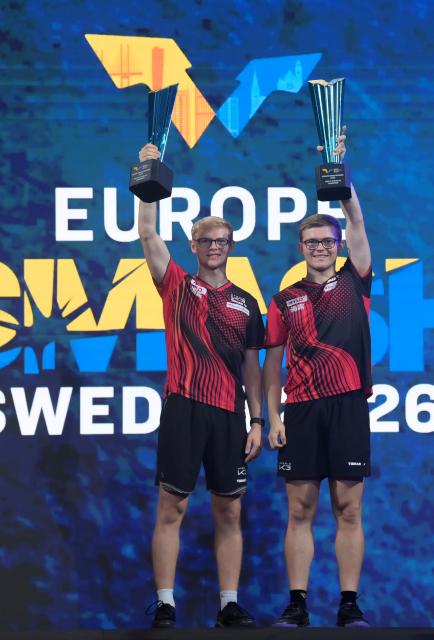 (260816) -- MALMO, Aug. 16, 2026 (Xinhua) -- Alexis Lebrun/Felix Lebrun (L) celebrate during the awarding ceremony for the men's doubles final match between and Alexis Lebrun/Felix Lebrun of France and Wong Chun Ting/Chan Baldwin of China's Hongkong at the WTT Europe Smash Sweden 2026 in Malmo, Sweden, Aug. 15, 2026. (Xinhua/Weng Xinyang)