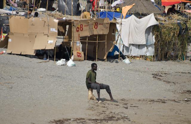 (260816) -- BEIJING, Aug. 16, 2026 (Xinhua) -- An irregular migrant is seen in Ceuta, Spain, Aug. 15, 2026. More than 72,000 migrants crossed irregularly into Ceuta from neighboring Morocco on July 30 and 31, according to the Spanish government. Most returned to Morocco later, while thousands remain in the enclave. (Xinhua/Cheng Min)