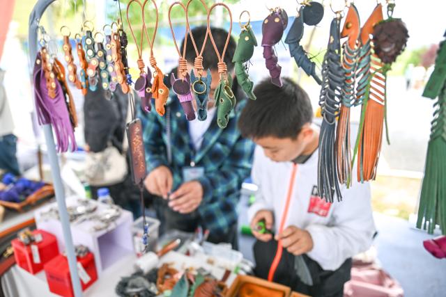 (260816) -- YAKESHI, Aug. 16, 2026 (Xinhua) -- Local specialty products are pictured at the Phoenix Mountain scenic area in Yakeshi of Hulun Buir, north China's Inner Mongolia Autonomous Region, Aug. 16, 2026. The scenic area has rolled out off-season ice-and-snow activities and cultural performances to draw visitors. (Xinhua/Lian Zhen)
