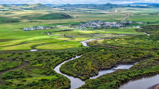 (260816) -- HULUNBUIR, Aug. 16, 2026 (Xinhua) -- An aerial drone photo taken on Aug. 16, 2026 shows a view of Hake Scarp and its surrounding areas in Hailar District of Hulun Buir, north China's Inner Mongolia Autonomous Region. (Xinhua/Lian Zhen)