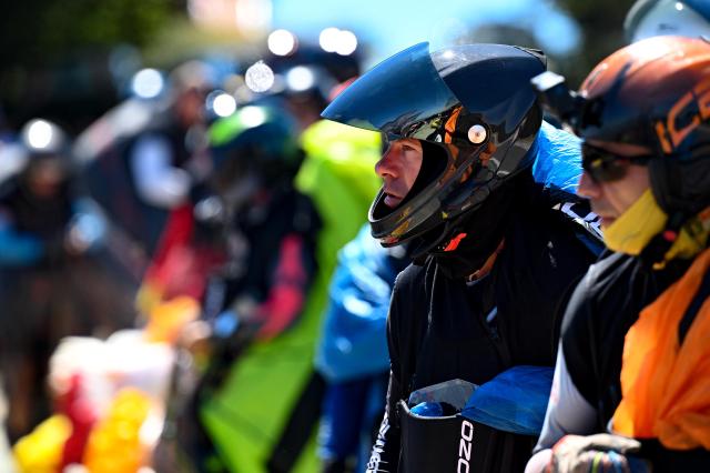 (260816) -- KRUSHEVO, Aug. 16, 2026 (Xinhua) -- A participant looks on during the 18th World Air Sports Federation (FAI) European Paragliding Championships in Krushevo, North Macedonia, Aug.16, 2026. The event is taking place from Aug. 8 to 19, bringing together 130 of Europe's top pilots. (Photo by Tomislav Georgiev/Xinhua)