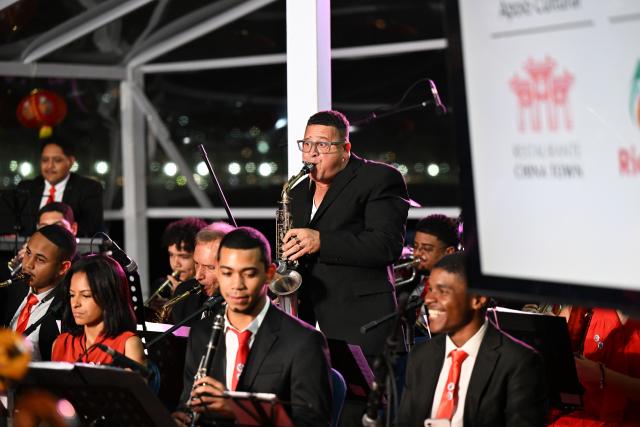 (260817) -- RIO DE JANEIRO, Aug. 17, 2026 (Xinhua) -- A musician plays the saxophone during a concert marking the 52nd anniversary of China-Brazil diplomatic relations at the Forte de Copacabana in Rio de Janeiro, Brazil, Aug. 16, 2026. The concert was held here on Sunday. (Xinhua/Jin Haoyuan)