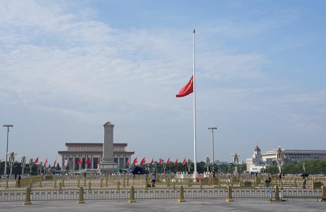 (260818) -- BEIJING, Aug. 18, 2026 (Xinhua) -- A Chinese national flag flies at half-mast to mourn the death of Comrade Zhu Rongji at Tian'anmen Square in Beijing, capital of China, Aug. 18, 2026. (Xinhua/Ju Huanzong)