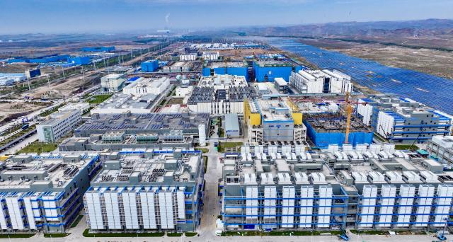 (260818) -- YINCHUAN, Aug. 18, 2026 (Xinhua) -- An aerial drone photo taken on Oct. 15, 2025 shows a view of a big data industrial park in Zhongwei, northwest China's Ningxia Hui Autonomous Region. (Xinhua)