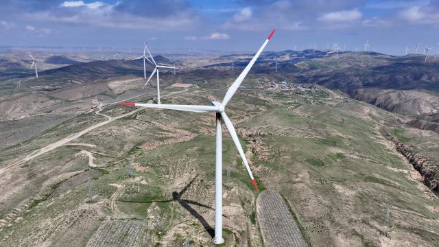 (260818) -- YINCHUAN, Aug. 18, 2026 (Xinhua) -- An aerial drone photo taken on June 25, 2026 shows wind turbines at a wind farm in Zhongwei, northwest China's Ningxia Hui Autonomous Region. (Xinhua)