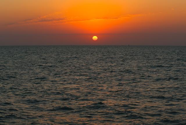 (260818) -- BAKU, Aug. 18, 2026 (Xinhua) -- This photo taken from a geophysical survey vessel operated by Caspian-Geo shows a view of the sunrise over the Caspian Sea near Baku, Azerbaijan, Aug. 18, 2026. (Xinhua/Chen Junfeng)