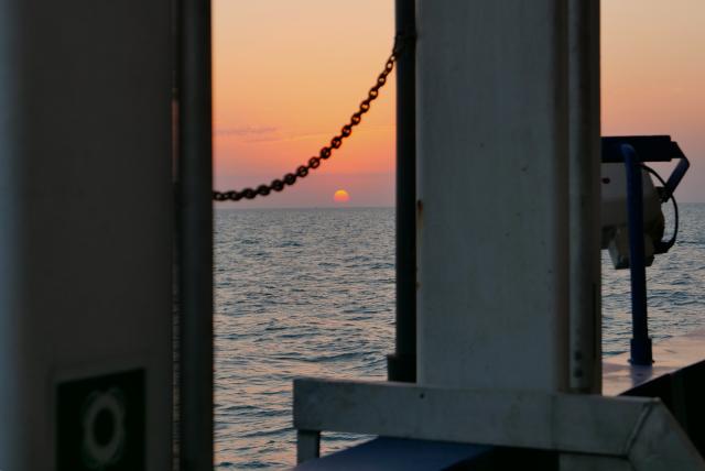(260818) -- BAKU, Aug. 18, 2026 (Xinhua) -- This photo taken from a geophysical survey vessel operated by Caspian-Geo shows a view of the sunrise over the Caspian Sea near Baku, Azerbaijan, Aug. 18, 2026. (Xinhua/Chen Junfeng)