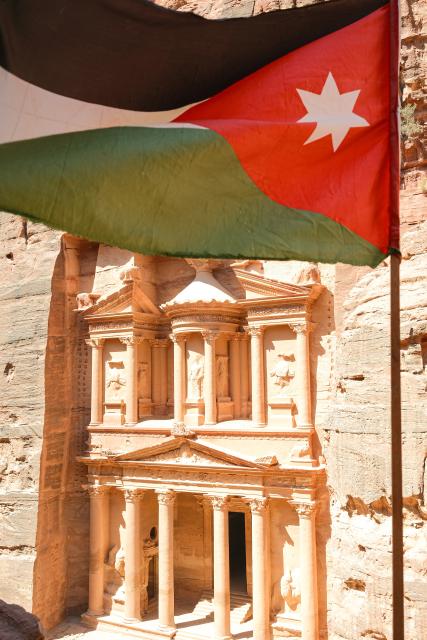 (260818) -- BEIJING, Aug. 18, 2026 (Xinhua) -- This photo taken on July 23, 2026 shows a scene at the Treasury in the ancient city of Petra, Jordan. Jiayuguan, the westernmost point of China's Ming Dynasty Great Wall, and the ancient city of Petra in Jordan are both landmarks boasting rich cultural heritage.
  In 2017, they established a twinhood relationship, built on the fact that both are UNESCO-listed World Heritage sites, distinguished by their unique and creative architecture in harmony with the natural environment.
  In 2025, the Chinese city of Jiayuguan and the Jordanian city of Petra signed an agreement on cooperation in culture and tourism at the archaeological site of Petra, seeking to strengthen the friendly ties between the two historical sites. (Xinhua/Xin Mengchen)