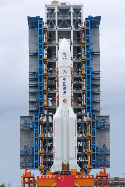 (260819) -- WENCHANG, Aug. 19, 2026 (Xinhua) -- The combination of the Chang'e-7 lunar probe and the Long March-5 Y14 carrier rocket is transferred vertically to the launching area at the Wenchang Spacecraft Launch Site in south China's Hainan Province, Aug. 19, 2026. The Chang'e-7 lunar probe is scheduled for launch at an appropriate time, according to the China Manned Space Agency (CMSA).
   The combination of the Chang'e-7 lunar probe and the Long March-5 Y14 carrier rocket was transferred vertically on Wednesday to the launching area at the Wenchang Spacecraft Launch Site in south China's Hainan Province, the CMSA said.
   The lunar probe and rocket had arrived at the launch site in April and July, respectively, and have since completed assembly and testing. The CMSA said all facilities and equipment at the launch site are in good condition, and the functional checks, joint test and propellant filling will be carried out before the launch as scheduled. (Xinhua/Yang Guanyu)
