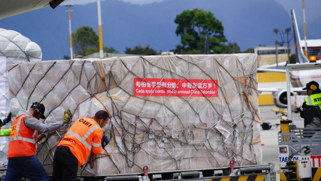 (260819) -- BOGOTA, Aug. 19, 2026 (Xinhua) -- Staff members transfer humanitarian earthquake relief supplies provided by the Chinese government at an airport in Bogota, Colombia, Aug. 18, 2026. Humanitarian earthquake relief supplies provided by the Chinese government arrived in Bogota on Tuesday to support Colombia's disaster response and post-disaster reconstruction efforts. (Xinhua/Li Zijian)