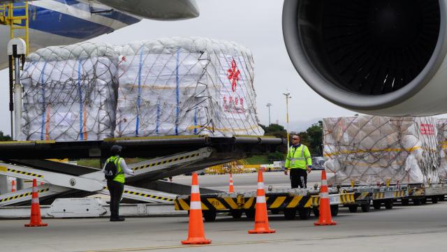 (260819) -- BOGOTA, Aug. 19, 2026 (Xinhua) -- Staff members unload humanitarian earthquake relief supplies provided by the Chinese government at an airport in Bogota, Colombia, Aug. 18, 2026. Humanitarian earthquake relief supplies provided by the Chinese government arrived in Bogota on Tuesday to support Colombia's disaster response and post-disaster reconstruction efforts. (Xinhua/Li Zijian)