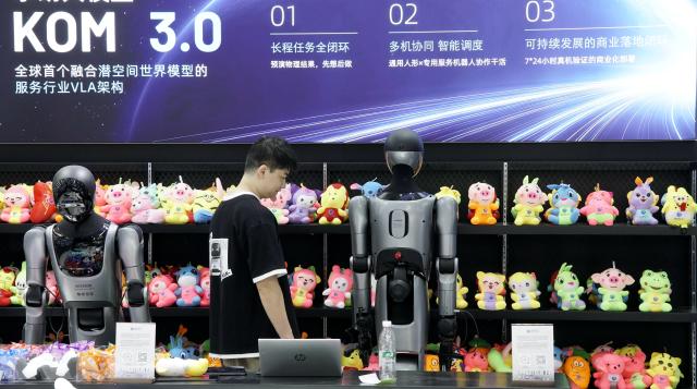 (260819) -- BEIJING, Aug. 19, 2026 (Xinhua) -- Robots are displayed during the 2026 World Robot Conference in Beijing, capital of China, Aug. 19, 2026. Themed "Human-Robot Symbiosis, Production-Demand Convergence," the 2026 edition of the conference kicked off here on Wednesday. (Xinhua/Li Xin)