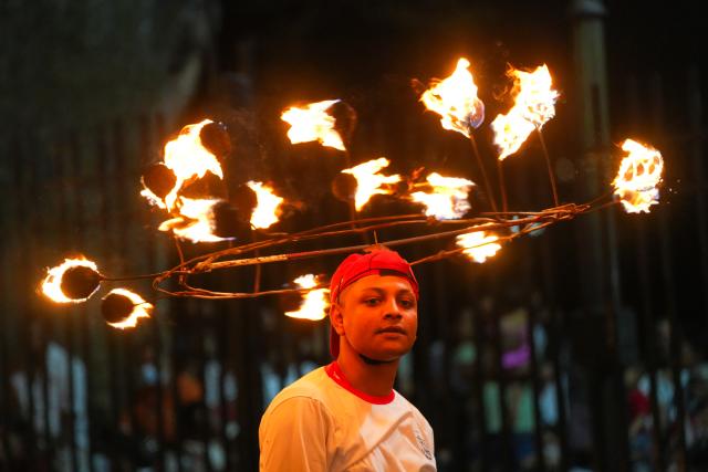 (260819) -- KANDY, Aug. 19, 2026 (Xinhua) -- A performer attends a procession celebrating the Esala Perahera festival in Kandy, Sri Lanka, on Aug. 18, 2026. Esala Perahera is one of the grandest Buddhist festivals in Sri Lanka, with a history of more than 1,000 years. (Photo by Thilina Kaluthotage/Xinhua)