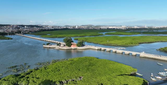 (260819) -- QUANZHOU, Aug. 19, 2026 (Xinhua) -- An aerial drone photo taken on Aug. 18, 2026 shows a view of Luoyang Bridge in Quanzhou, southeast China's Fujian Province. Luoyang Bridge, also known as Wan'an Bridge, is a component of the UNESCO World Heritage site "Quanzhou: Emporium of the World in Song-Yuan China." 
  In recent years, Quanzhou has woven cultural heritage into daily life by introducing intangible cultural heritage programs and cultural and creative businesses, attracting more tourists to the area. (Xinhua/Lin Shanchuan)