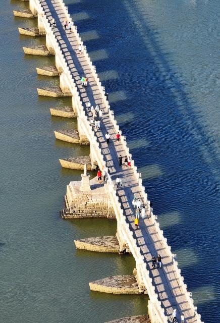 (260819) -- QUANZHOU, Aug. 19, 2026 (Xinhua) -- An aerial drone photo taken on Aug. 18, 2026 shows a view of Luoyang Bridge in Quanzhou, southeast China's Fujian Province. Luoyang Bridge, also known as Wan'an Bridge, is a component of the UNESCO World Heritage site "Quanzhou: Emporium of the World in Song-Yuan China." 
  In recent years, Quanzhou has woven cultural heritage into daily life by introducing intangible cultural heritage programs and cultural and creative businesses, attracting more tourists to the area. (Xinhua/Lin Shanchuan)